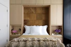 Floating black bed with headboard with lines makes it comfortable and gives it modern look. 30 Headboards To Inspire Your Next Bedroom Redo Architectural Digest
