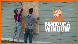 Hammer the lead sleeve anchors into the wall. How To Board Up Windows The Home Depot
