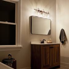 It uses three 60 watt (max.) bulb equivalent and measures 23 inches in width with a body height of 8.25 inches. Avery 3 Light Vanity Light Brushed Nickel Kichler Lighting