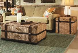 Deal with all those throws and pillows cluttering up your seating area with the safavieh navarro rattan trunk coffee table. Light Brown Rattan Trunk Table With Storage Plus Black Leather Straps And Golden Steel Handler Placed On The Gree Wicker Coffee Table Furniture Baby Room Decor