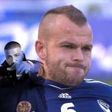 Leigh Broxham re-signs