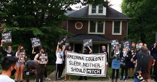 Uhhhhh look at this picture of mitch mcconnell's hands that @lizzyratner found on ap pic.twitter.com/y4ljl7madh. No Justice No Sleep Dawn Protest Over Police Killing Of Breonna Taylor Outside Mcconnell S Kentucky Home Common Dreams News