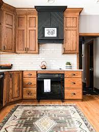 There are 7 doors and 3 windows in the room that are all dark wood with dark wood trim. How To Make An Oak Kitchen Cool Again Copper Corners