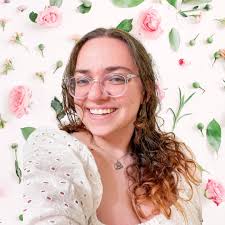 What to fill the space with around hello kitty in a memorial tattoo?