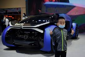 That is almost twice as many as the rest of the world. Crowds In Face Masks Pack China Auto Show