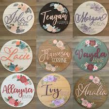 Round Floral Shiplap Baby Name Sign For Nursery Or Shower Etsy In 2021 Baby Name Signs Baby Girl Names Baby Girl Sign