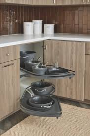 New Products Include An Under Sink Caddy Pull Down Spice Racks And Pull Out Cabinet St Corner Kitchen Cabinet Corner Storage Cabinet Kitchen Appliance Storage