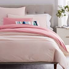 Four interior corner ties keep it in place. Organic Sateen Reversible Duvet Cover Shams