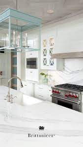 I am painting my old orangey oak cabinets distant gray an offwhite color by benjamin moore. An Elegant Marble Alternative Cambria Quartz Brittanicca Has The Durable And Low Maintenance Benefits White Kitchen Design Home Decor Kitchen Kitchen Remodel