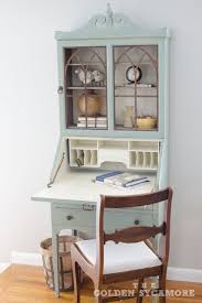 The center section folds out to become a secretary with four drawers and two center shelves. Vintage Secretary Desk Makeover Ideas Within The Grove