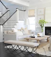Above, a white coffered ceiling mirrors the look of the room. A Beautiful White Living Room Arianna Belle