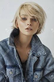 It looks cool and effortless, the two ideals of 90s hairstyles. Portrait Of Fashion Blonde Woman With Short Hair Wear Denim Jacket Stock Photo Picture And Royalty Free Image Image 140011630