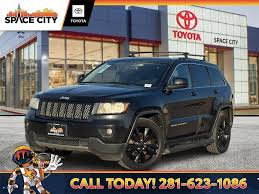 Image result for Brilliant Black 2012 Grand Cherokee