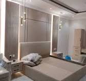 ‫تفصيل غرف نوم مودرن | تصميم غرف نوم خشب | فني ديكور غرف نوم الكويت, 🛏️  تصميم غرفة نوم متكاملة بتفاصيل مبهرة, هل تحلم بغرفة نوم تشع فخامة وراحة  نفسية؟, هذا التصميم يجمع بين:, الإضاءة الجانبية الدافئة, ...‬‎
