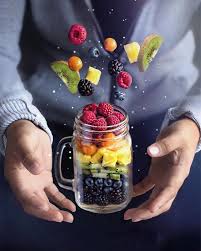 Magical Levitation Powers Vibrant Rainbow Fruit Jar Filled With Raspberries Golden Berries Pineapple Chunks Kiwi Blue Fruit Photography Rainbow Fruit Food