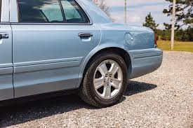 Image result for Light Ice Blue 2010 Crown Victoria