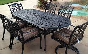 Flamingo Cast Aluminum 7pc Outdoor Patio Set With 42 X87 Oval Table Desert Bro In 2020 Cast Iron Patio Furniture Wrought Iron Patio Set Wrought Iron Patio Furniture