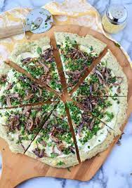 The Best Vegan White Pizza Garlic Herb Dough Topped With A Creamy White Sauce Caramelized Onions Fresh Herbs And Savory Vegan Dairy Free Pizza Vegan Eating