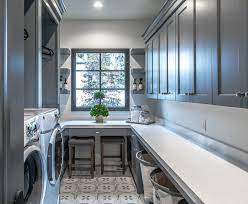 Beige is one of those colors that is beautiful, timeless, and will never get old. Laundry Room Features Dark Grey Laundry Room Cabinets Paint Color Is Benjamin Moore Trout Grey Grey Laundry Rooms Mudroom Laundry Room Laundry Room Tile