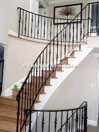 Repainting faux wrought iron is fairly easy, and fixing loose railings is typically manageable for the average homeowner. Interior Railings Indoor Stair Railing Iron Staircase Railing Wrought Iron Staircase