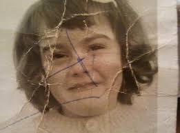 Hi can anyone please get rid of the damage to this photo it would mean a  lot to my parents as it's the only professional picture of me and my older  brother