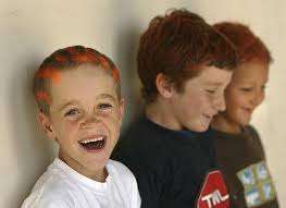 Family, friends raise funds with orange hair