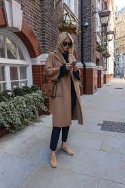 I am 5'1, and took this coat in an xs. Chic Navy Camel Emma Hill