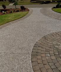 Flat types of edging will sit level with your driveway and rely a lot on color and shape to create a contrast. Transform Your Driveway With These Standout Paving Ideas Realty Times