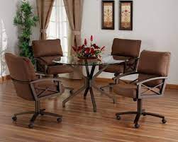 They are all fitted with casters that can rotate 360 degrees and feature a tilt mechanism to support your weight when you feel like reclining back. Tempo Amsterdam Swivel Tilt Caster Dining Set Dinette Sets Glass Dining Room Table Unique Dining Room