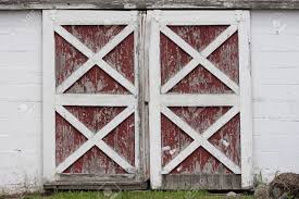 It is a perfect paint color to add comfort to any living space. Rustic Old Red And White Barn Doors With Peeling Paint Stock Photo Picture And Royalty Free Image Image 4874630