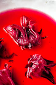 Candied and dried hibiscus flowers, indeed! Vanilla Coconut Panna Cotta With Hibiscus Berry Sauce B Sweet