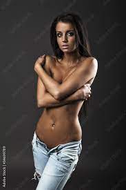Topless girl in jeans Stock Photo | Adobe Stock