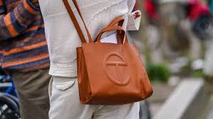 Bag definition, a container or receptacle of leather, plastic, cloth, paper, etc., capable of being closed at the mouth; Telfar Bags Are Now In The Pandemic Fashion Canon Gq