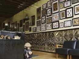 The studio is composed of tattoo artists specializing in a wide range of tattoo styles, including traditional black and gray, etching, and kanji and japanese mythology and imagery. American Electric Tattoo Co