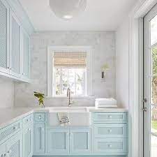 Therefore, it is suggested that you use light and bright colors to paint the room to create an illusion of spaciousness. White And Sky Blue Laundry Room Colors Design Ideas