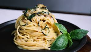 Stir in the tomatoes, basil, lemon juice, and parmesan cheese. How To Make Fried Zucchini Pasta Spaghetti Alla Nerano Recipe Vincenzo S Plate