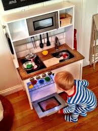 Ikea Duktig Play Kitchen Hack Butcher Block Effect To Counter Top Metallic Spray Paint To Oven And Microw Ikea Play Kitchen Ikea Toy Kitchen Ikea Kitchen Diy