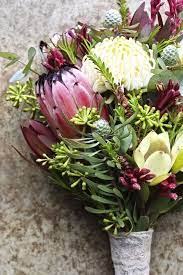 Your In Season Guide To Beautiful Winter Wedding Flowers With Images Queensland Brides Winter Wedding Flowers Wedding Bouquets Protea Bouquet
