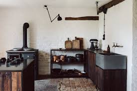 Unlike neutral wood cabinet, the colors of this cabinet are livelier. Wood Steel And Concrete Krautkopf Countryside Kitchen Kitchen Remodel Rustic Kitchen