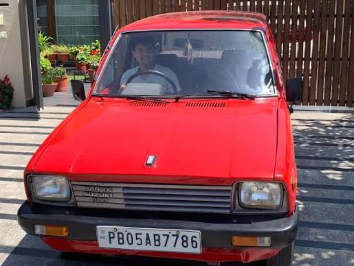 Prime Minister Indira Gandhi, with Rajiv Gandhi and ND Tiwari in the background, inspects a model car Maruti 800 before inaugurating the Maruti factory in Delhi on December 14, 1983 !