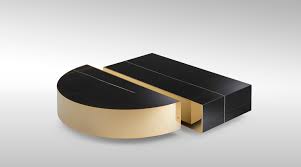 This rectangular transforming coffee table helps save space with its adjustable height glass top sitting lightly on a metal frame. Fendi Casa Launches Exclusive Coffee Tables Architectandinteriorsindia