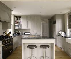 The color of the cabinets and the floors was too similar and the small island was lost in sea of golden oak. Carmen S Corner Warm Or Cool Paint Colors