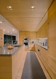 Consider alternative ways to add style to oak cabinets with contemporary pulls, sleek countertops and fixtures, or a backsplash in modern geometric shapes. Modern Kitchen With Light Wood Cabinets And Gray Countertops Hgtv