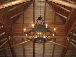 Cast horn designs large wagon wheel chandelier with rustic lanterns. Custom Wrought Iron Chandeliers Chicken Coop Forge Blacksmith S Design Rustic Lighting Wrought Iron Chandeliers Iron Chandelier Rustic Iron Chandeliers