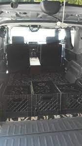 The galley kitchen includes a sink, two burner stove, an open shelving system, storage tower (with milk crate drawer system), cooler platform (with 12v outlet), and a 16 gallon trash can. Milk Crates Bed Platform Support Crate Bed Milk Crates Honda Element Camper