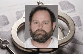 Middle School Custodian Arrested for Online Solicitation of a Minor