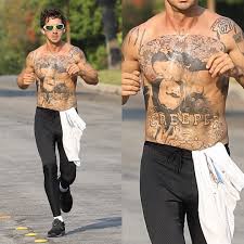 Et Canada On Instagram Shia Labeouf Shows Off His Inked Torso During A Run In Pasadena California Backgrid Shialabeouf Shia Labeouf Shia Spice Girls