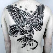 50 Eagle Back Tattoo Designs For Men Flying Bird Ink Ideas Back Tattoo Designs Traditional Back Tattoo Tattoo Designs