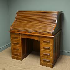 The drop front and top drawer have locks. Antique Roll Top Desk Antiques World