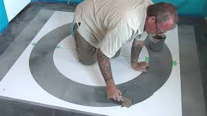 Concrete Stencils Using Stencils With A Skimcoat Painted Concrete Floors Concrete Decor Stenciled Floor